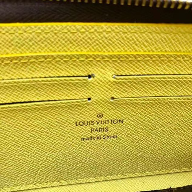 Louis vuitton monogram canvas clemence wallet m61796 yellow