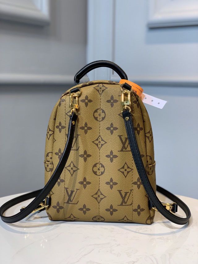 Louis vuitton handmade monogram reverse palm springs backpack mini M42411